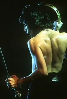 Prints of British rock band Queen perform in concert with Freddie Mercury wearing black leotard at the Forum on December 22, 1977 in Inglewood, California Queen Unleashed: Queen Performing in LA