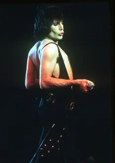 Prints of British rock band Queen perform in concert with Freddie Mercury wearing black leotard at the Forum on December 22, 1977 in Inglewood, California Queen Unleashed: Queen Performing in LA