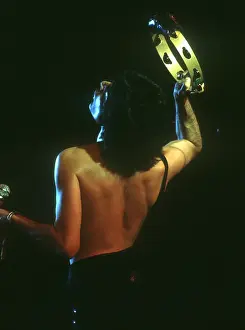 Prints of British rock band Queen perform in concert with Freddie Mercury wearing black leotard at the Forum on December 22, 1977 in Inglewood, California Queen Unleashed: Queen Performing in LA