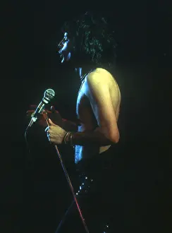 Prints of British rock band Queen perform in concert with Freddie Mercury wearing black leotard at the Forum on December 22, 1977 in Inglewood, California Queen Unleashed: Queen Performing in LA