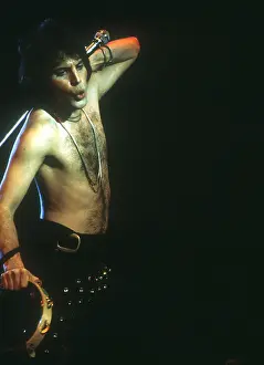 Prints of British rock band Queen perform in concert with Freddie Mercury wearing black leotard at the Forum on December 22, 1977 in Inglewood, California Queen Unleashed: Queen Performing in LA