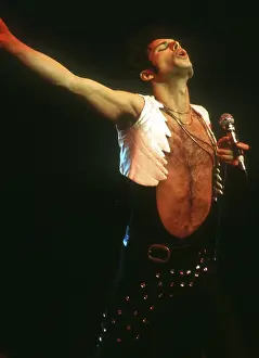 Prints of British rock band Queen perform in concert with Freddie Mercury wearing black leotard at the Forum on December 22, 1977 in Inglewood, California Queen Unleashed: Queen Performing in LA