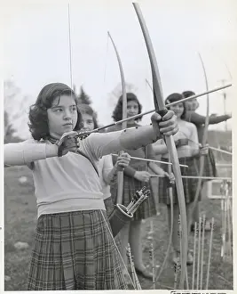 Marie Dionne Prints: The Quintuplets Aiming in Archery