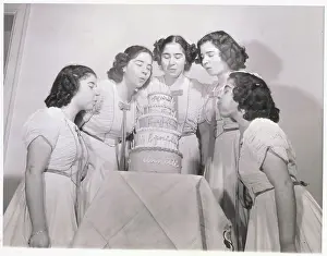 The Quintuplets Blowing Out Candles