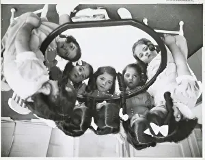 Marie Dionne Prints: The Quintuplets Gazing Into Mirror