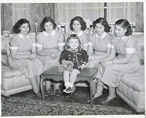The Quintuplets Posing with Their Younger Sister