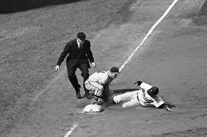 R. Nelson, E. Mathews, & Umpire T. Gorman