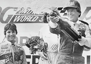 Spraying Prints: Race Car Driver Mario Andretti and Friends Celebrating with Champagne