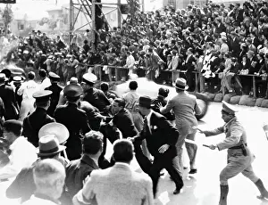 Racetrack Prints: Race Car Whizzing Past Crazed Spectators