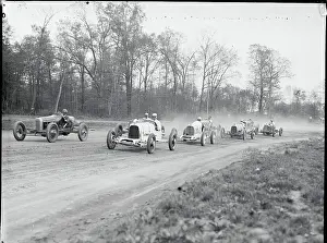 Fast Prints: Race Cars Racing on Track