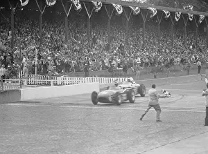 Race Cars Speeding Across Finish Line