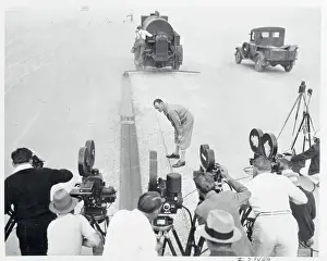 Racer Malcolm Campbell Examining Racing Guideline