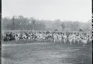 Racers Running Across Park