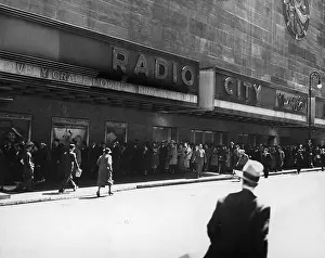 Prints of A queue for Josef von Sternberg's musical, The King Steps Out outside Radio City Music Hall in the Rockefeller Center, New York, 1936. (Photo by Frederic Lewis/Hulton Archive/Getty Images) Where New York’s brightest moments take center stage: Radio City Music Hall