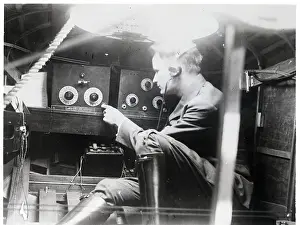 Turning Prints: Radio Operator Turning Radio Up