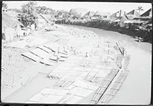 Jakarta Prints: Rafts Built of Logs Floating in River