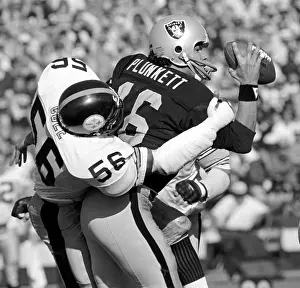 Raiders QB Jim Plunkett tackled by Steelers Robin Cole