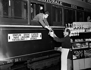 Flask Prints: Railside Vendors Meet Train At Station