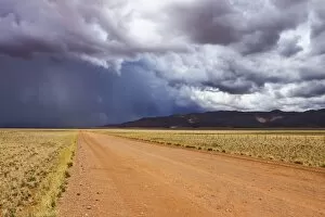 Images Dated 8th February 2012: Rain front on the D707 road in the south of Namibia, Africa