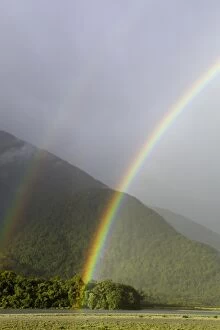 Images Dated 15th April 2010: Rainbow over Hst River and native bush, N.Z