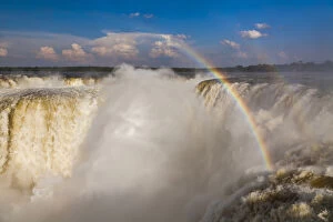 Images Dated 13th November 2015: Rainbow over the Iguazu Falls at sunset