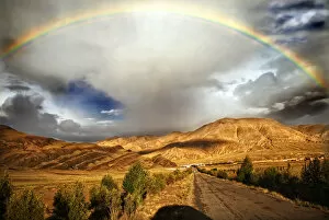 Rainbow after storm over Tingri, Tibet