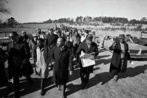 Selma Prints: Ralph Abernathy Reading Newspaper During March