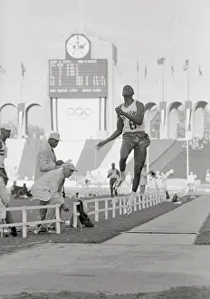 Ralph Boston Performing Record Breaking Jump at Olympics