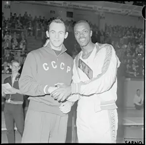 Ralph Boston Shaking Hands with a Colleague