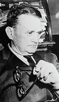 Ralph McGill Holding Eyeglasses