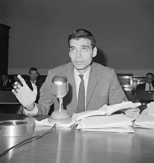 Ralph Nader Sitting at Microphone