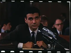 Ralph Nader Testifying at a Meeting