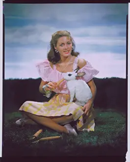 Rabbit Prints: Ramsay Ames Posing with Rabbit