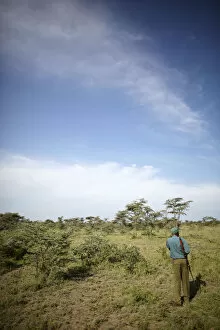 Ranger in the Serengeti, Tanzania, Africa