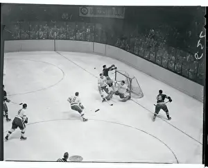 Rangers and Red Wings Playing Ice Hockey