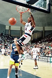 Prints of University of Connecticut star player Ray Allen dunks home two points in a game against West Virginia, Storrs CT 1996. (Photo by Bob Stowell/Getty Images) Courtside Vibes: Stunning Basketball Prints: Ray Allen Jams
