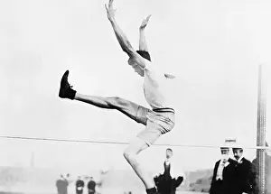 Prints of (Original Caption). Olympic Games, London, England 1908. Standing high jump, Ray Ewry Capturing Glory: A Journey Through Olympic History: Ray Ewry Jumping Over Bar