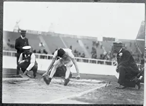 Prints of (Original Caption). Olympic Games, London, England 1908. Standing broad jump, Ray Ewry Capturing Glory: A Journey Through Olympic History: Ray Ewry Performing Broad Jump
