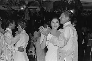 State Of California Prints: Reagan and Marcos Swap Dance Partners