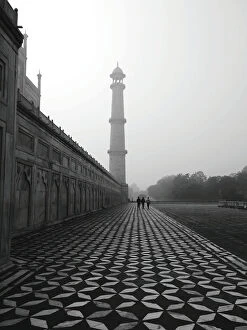 Rear View Of People Walking At Taj Mahal Against Clear Sky
