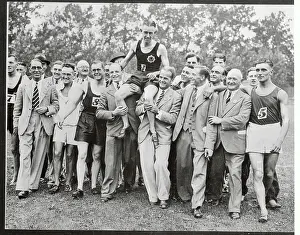 Record Breaking Runner Sydney Wooderson Being Carried by Peers