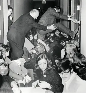 Sit In Prints: Recruiters Attempting to Climb over Protesters