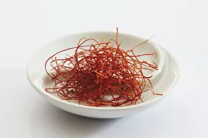 Images Dated 20th July 2011: Red chilli threads in a small porcelain bowl