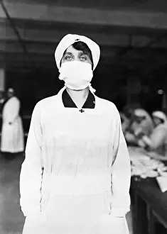 Red Cross Worker With Influenza Mask