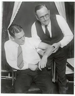 Red Grange Holding Lame Arm