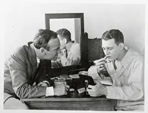 Red Grange Putting on Makeup