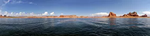 Red Navajo sandstone cliffs, rock formations, rising from Lake Powell, Page, Arizona, USA