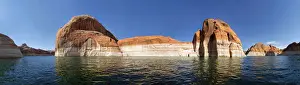 Southwest Usa Prints: Red Navajo sandstone cliffs, rock formations rising from the deep blue waters of Lake Powell