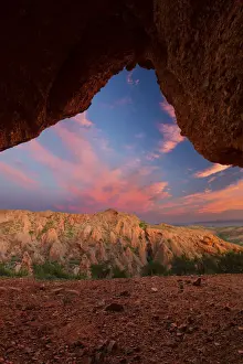 Butte Prints: Red rock mountain with arch sunset with clouds near Calitzdorp in South Africa