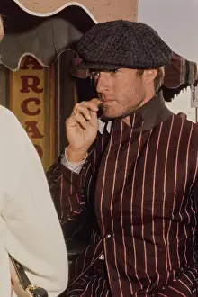 Prints of American actor Robert Redford wearing a striped brown jacket and a grey newsboy cap, the set of The Sting, filmed in the United States, 1973 Robert Redford: Classic Hollywood Elegance: Redford in The Sting